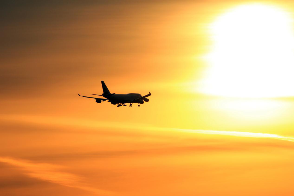 A single plane in the lightful sky.