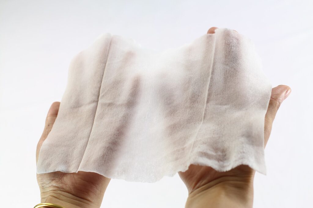 A spread wipe in one hand